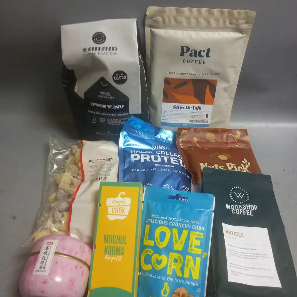 TOTE OF APPROX 10 ASSORTED FOOD ITEMS TO INCLUDE - NEIGHBOURHOOD COFFEE ROASTERS ESPRESSO BLEND - ROSE LYCHEE BLACK TEA - NUTS PICK BELGIAN CHOCOLATE RAISINS ETC