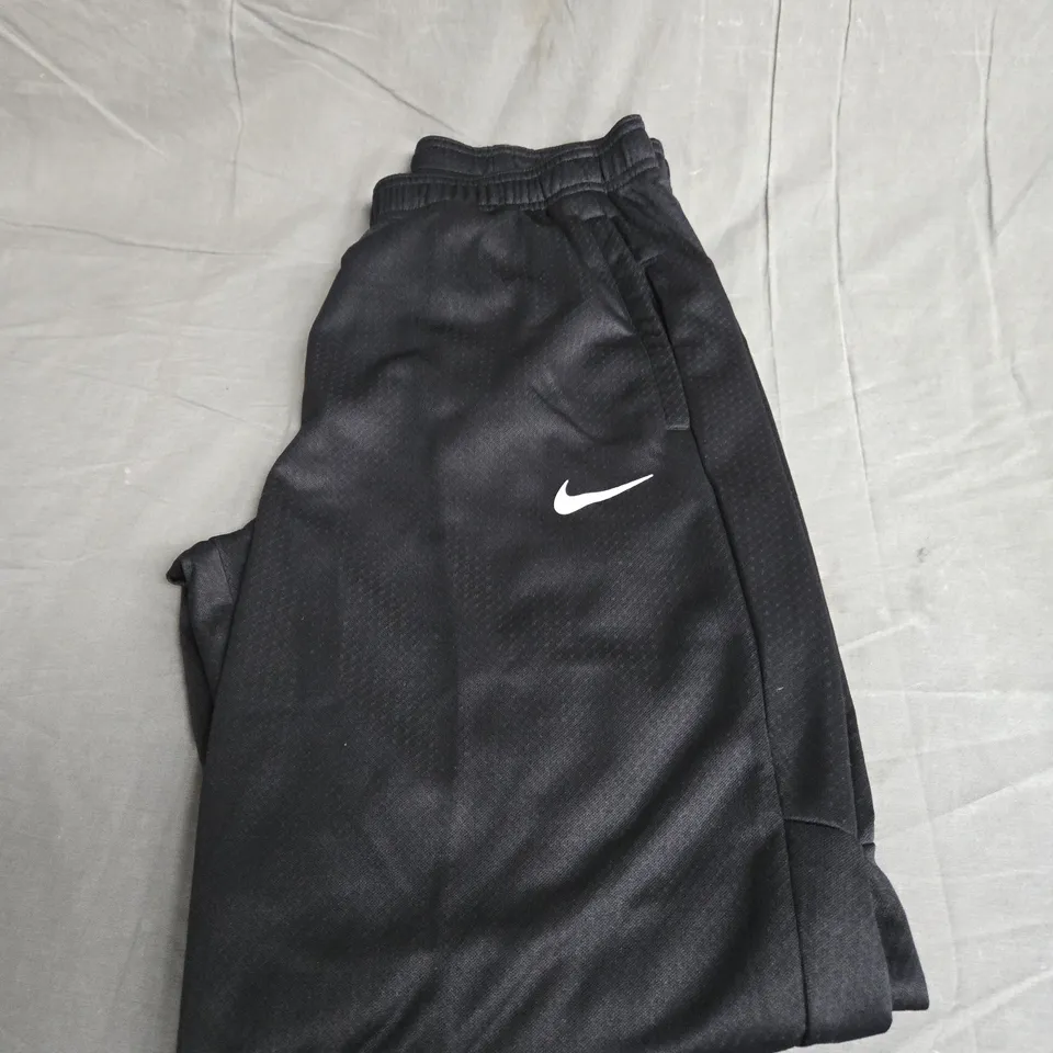 NIKE TRACKSUIT PANTS SIZE M