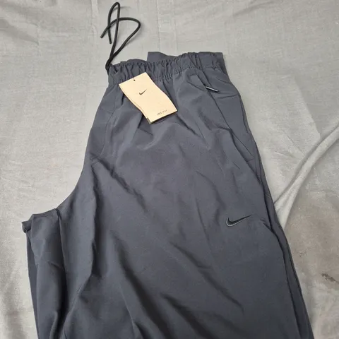 NIKE DRI-FIT TROUSERS SIZE M