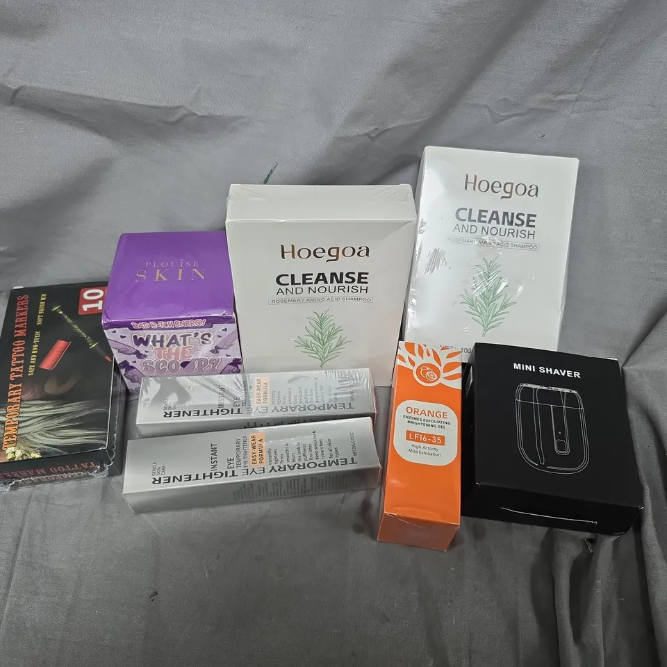 APPROXIMATELY 25 ASSORTED COSMETICS ITEMS TO INCLUDE TEMPORARY EYE TIGHTENER, BAD BITCH ENERGY WHATS THE SCOOP BODY SCRUB, HOEGOA ROSEMARY SHAMPOO, ETC