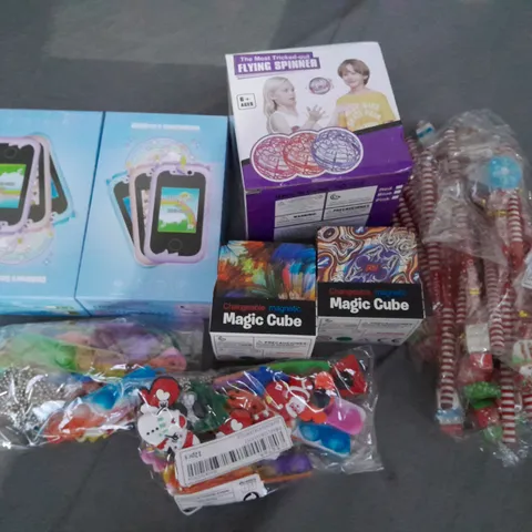 LOT OF ASSORTED TOYS TO INCLUDE MAGNETIC MAGIC CUBES AND KIDS SMARTPHONES