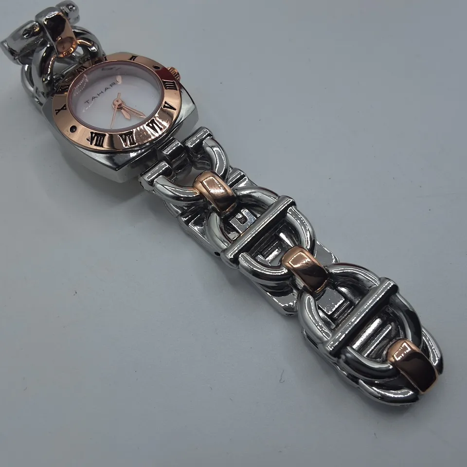 TAHARI WHITE DIAL LADIES WATCH WITH STAINLESS STEEL BACK AND RED GIFT BOX