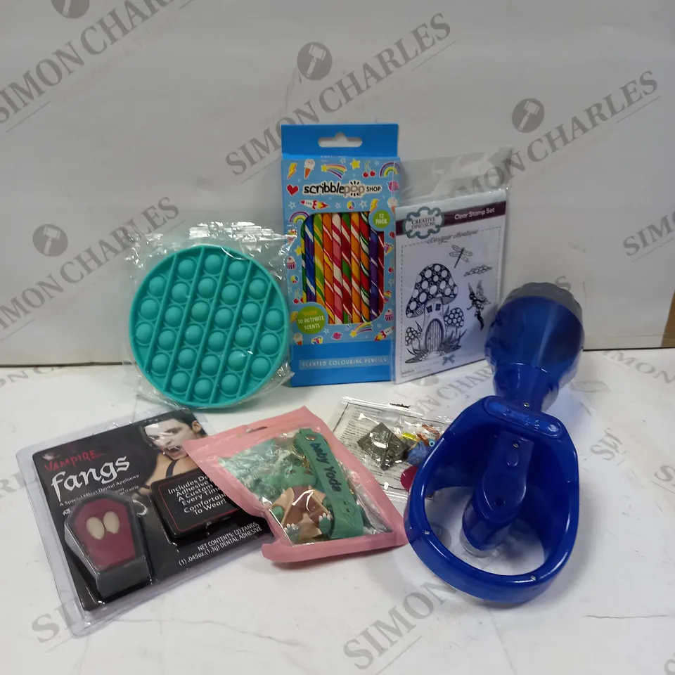 LARGE QUANTITY OF ASSORTED TOYS AND ACCESSORIES TO INCLUDE; CREATIVE EXPRESSIONS CLEAR STAMP SET, BABY YODA KEY RING, VAMPIRE FANGS AND MAGIC THE GATHERING CARDS