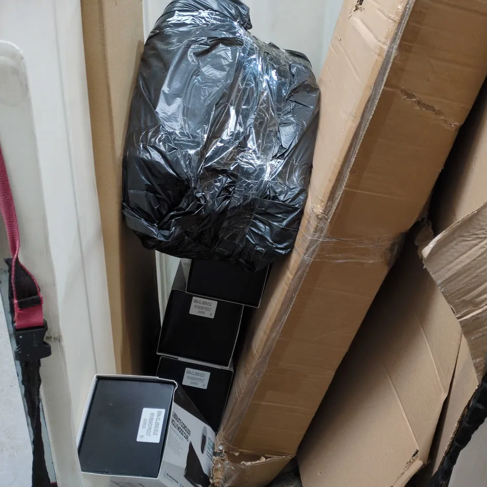 CAGE OF ASSORTED ITEMS TO INCLUDE FLATPACK, RUGS AND HAIR CIURLERS