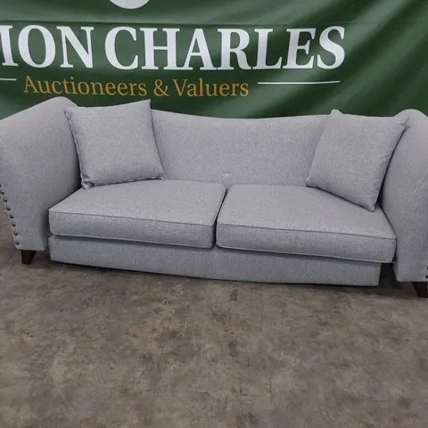 DESIGNER FOUR SEATER SOFA GREY FABRIC WITH STUDDED DETAIL