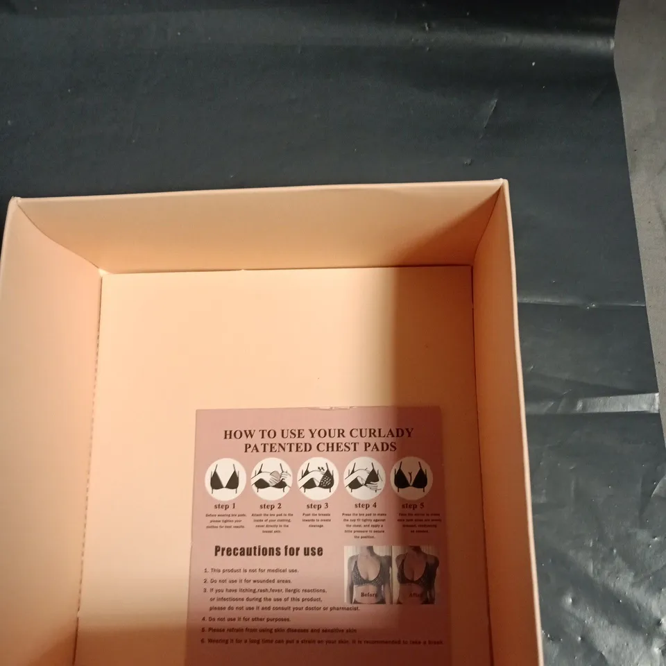 VORYNA CHEST PADS – PINK BOX WITH INSTRUCTION SHEET