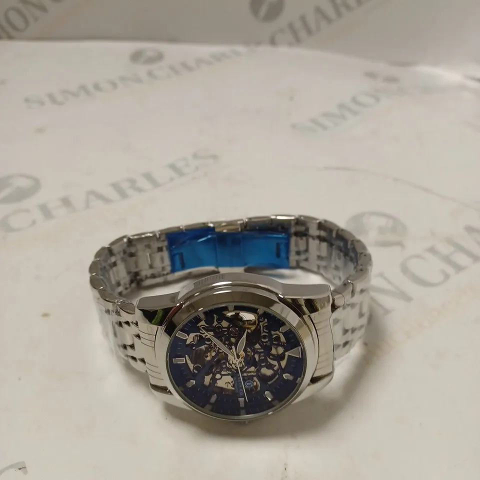 MEN’S TALIS CO 7820 AUTOMATIC WATCH – BLUE SKELETON DIAL AND CASE – STAINLESS STEEL STRAP – GLASS BACKCASE
