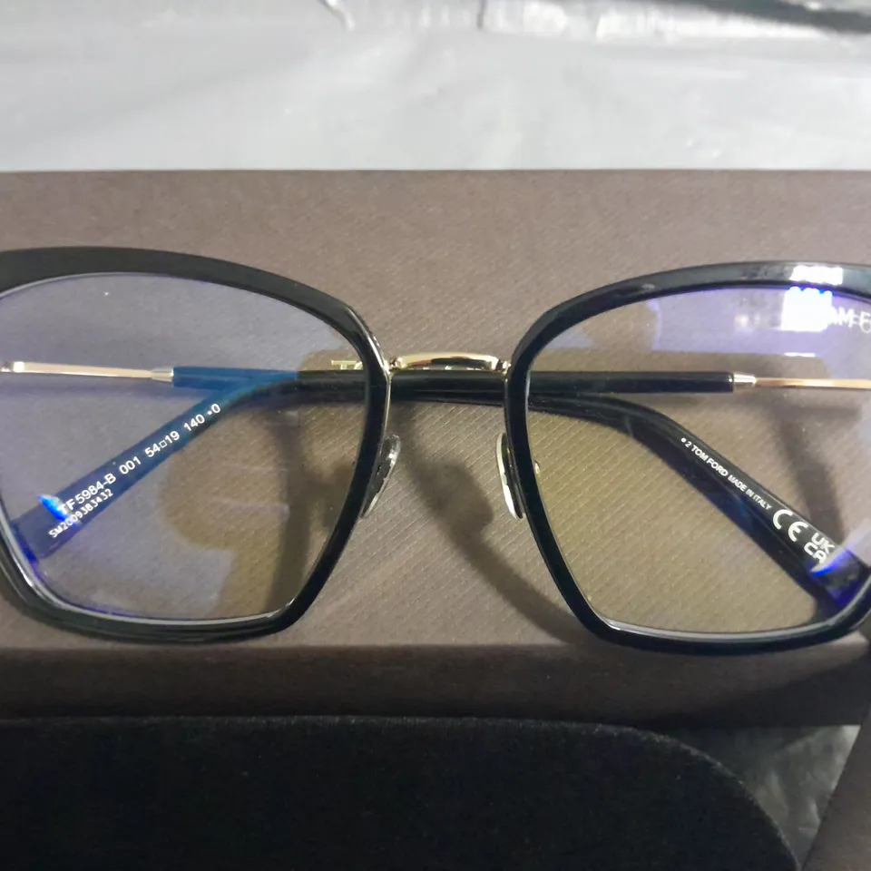 BOXED PAIR OF TOM FORD BLACK AND GOLD GLASSES