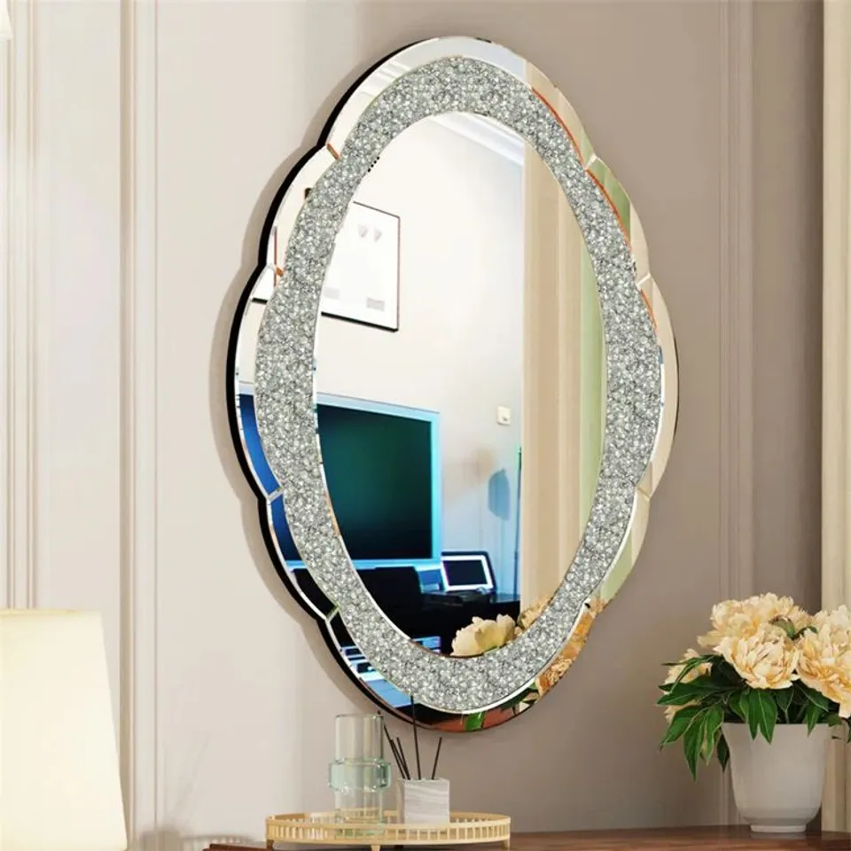 A BOXED ORTRUD NOVELTY WALL MOUNT MIRROR