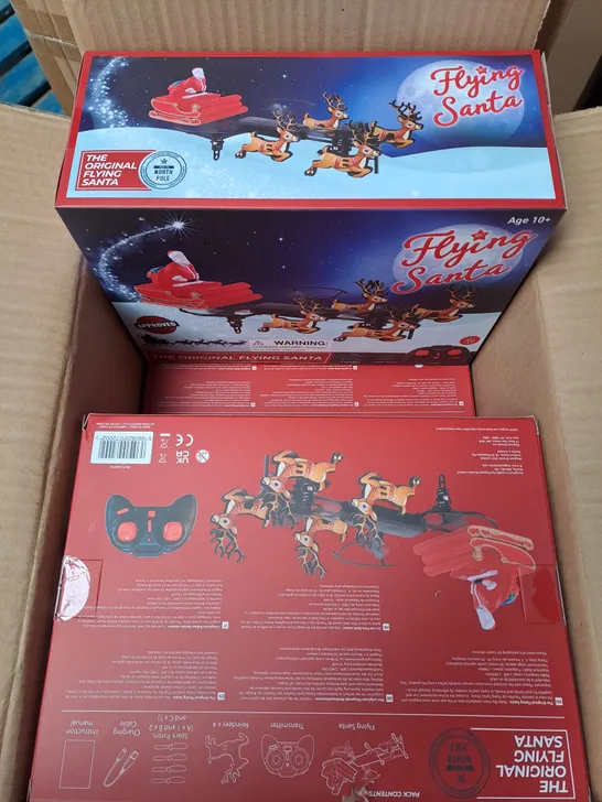 Lot 7103: 6 X BOXED MAGNUM BRANDS FLYING SANTA REMOTE CONTROL TOYS ...