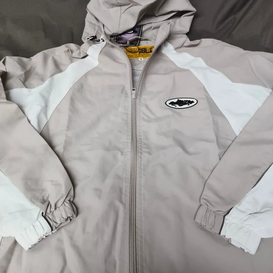 BAGGED CORTEIZ WINDBREAKER JACKET - SIZE M