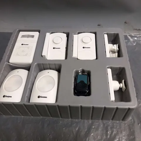 BOXED SWANN SECURITY SENSORS AND FOBS