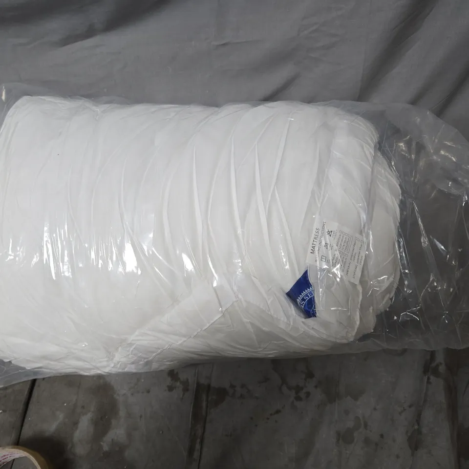 ROLLED WHITE MATTRESS IN CLEAR PLASTIC WRAP 