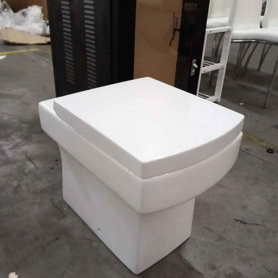 THREE WHITE CERAMIC WC PANS WITH CISTERN AND SHATAFF