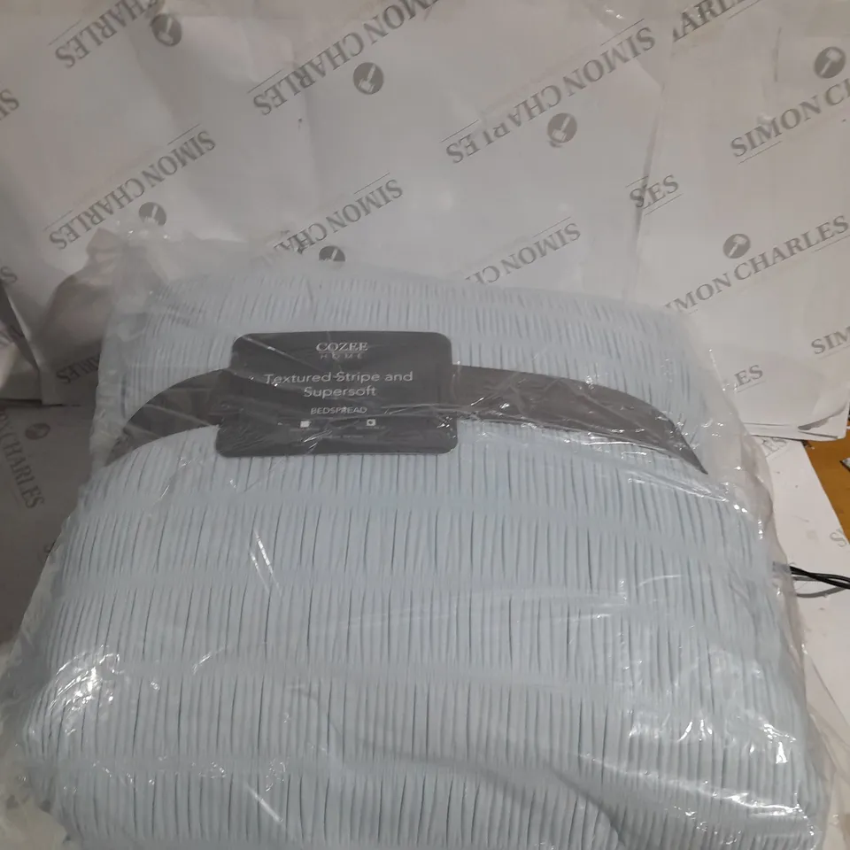 BOXED SUPERSOFT BY COZEE HOME TEXTURED STRIPE BEDSPREAD WITH CONTRAST BORDER IN SOFT BLUE - SIZE: 250 X 260CM 
