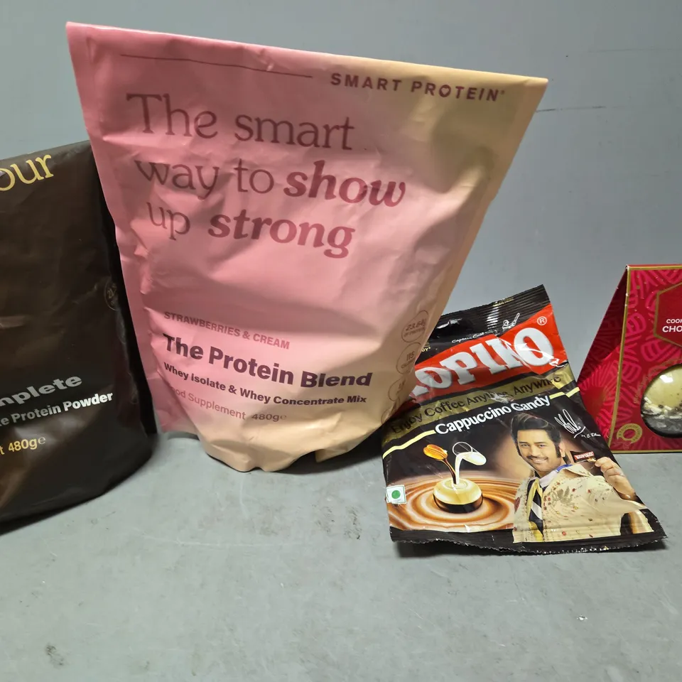 TOTE OF APPROXIMATELY 7 ASSORTED FOOD ITEMS TO INCLUDE - CHOC BOMBE , THE PROTEIN BLEND , KOPIKO CAPPUCCINO CANDY ETC