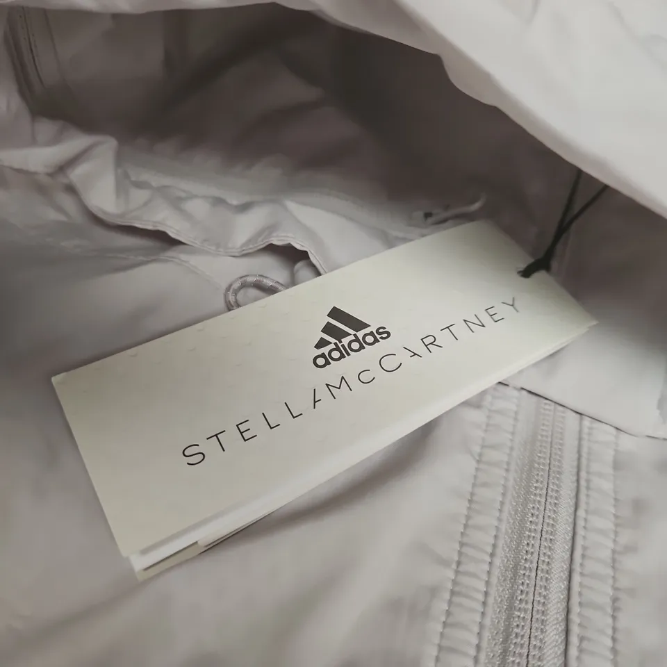 ADIDAS BY STELLA MCCARTNEY WOMEN'S WINDBREAKER JACKET – LIGHT GREY WITH NEON YELLOW PANELS, UK S