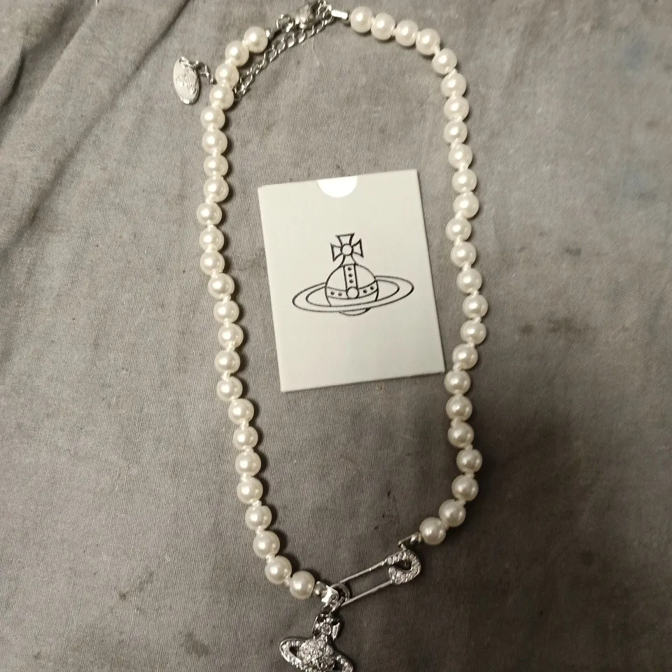 VIVIENNE WESTWOOD PEARL BRACELET WITH ORB CHARM – BOXED