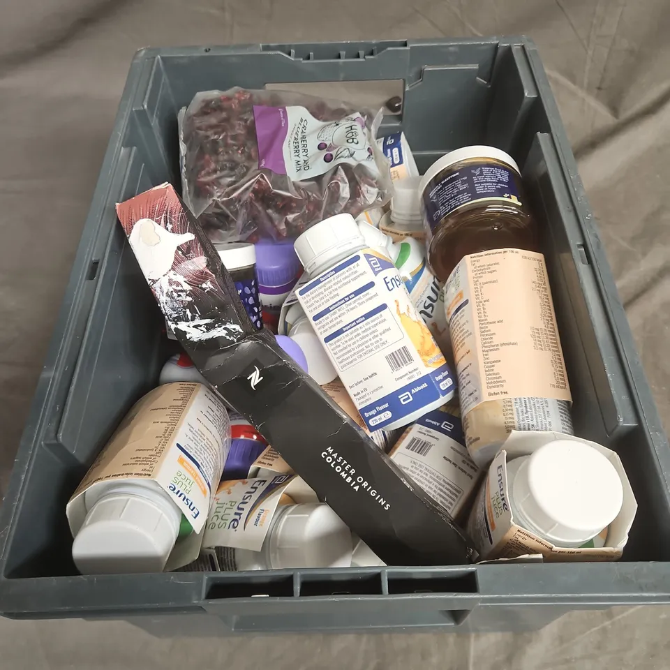 TOTE OF APPROXIMATELY 11 ASSORTED FOOD AND DRINK ITEMS TO INCLUDE SLEEPTIME HONEY , ENSURE PLUS JUICE , COFFEE PODS , ETC