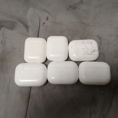 6 USED APPLE AIRPOD CASES FOR VARIOUS MODELS TO INCLUDE A2190, A2700, A1602, ETC