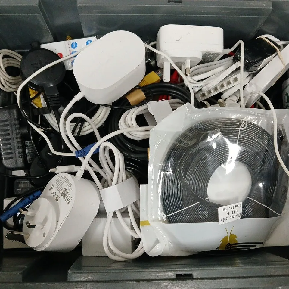 APPROXIMATELY 12 ASSORTED HOUSEHOLD ITEMS TO INCLUDE CABLES, REMOTES, SKY BOXES, ETC