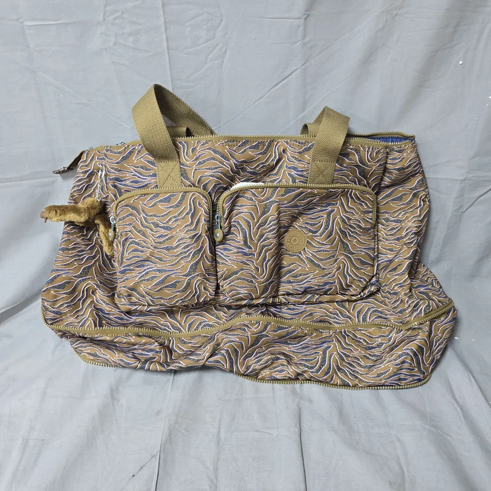 KIPLING HANDBAG WITH MONKEY KEYCHAIN – TAN/BROWN FABRIC WITH BLUE PATTERN