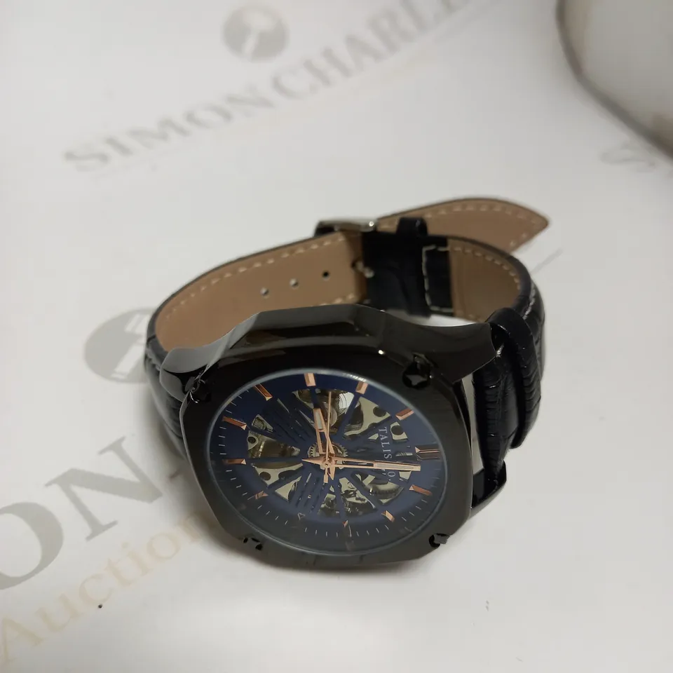 MEN’S TALIS CO AUTOMATIC WATCH – BLUE SKELETON DIAL – GENUINE LEATHER STRAP – GLASS BACKCASE