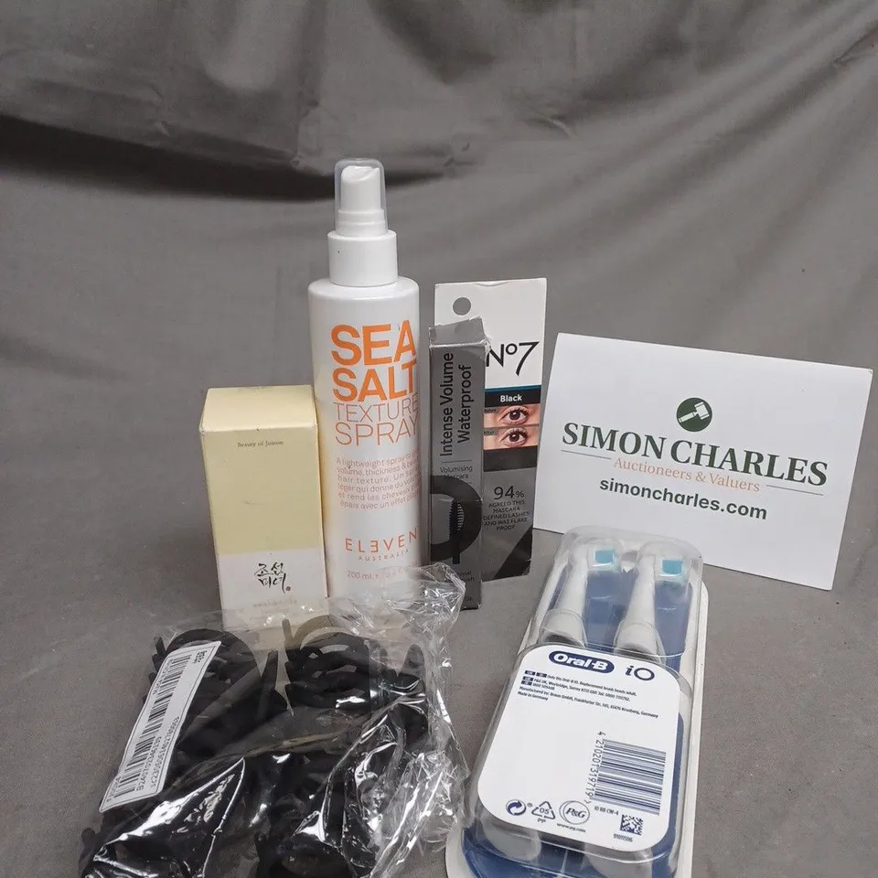 TOTE OF ASSORTED COSMETIC ITEMS TOO INCLUDE , TOOTHBRUSHES , FACIAL TONER , ETC 