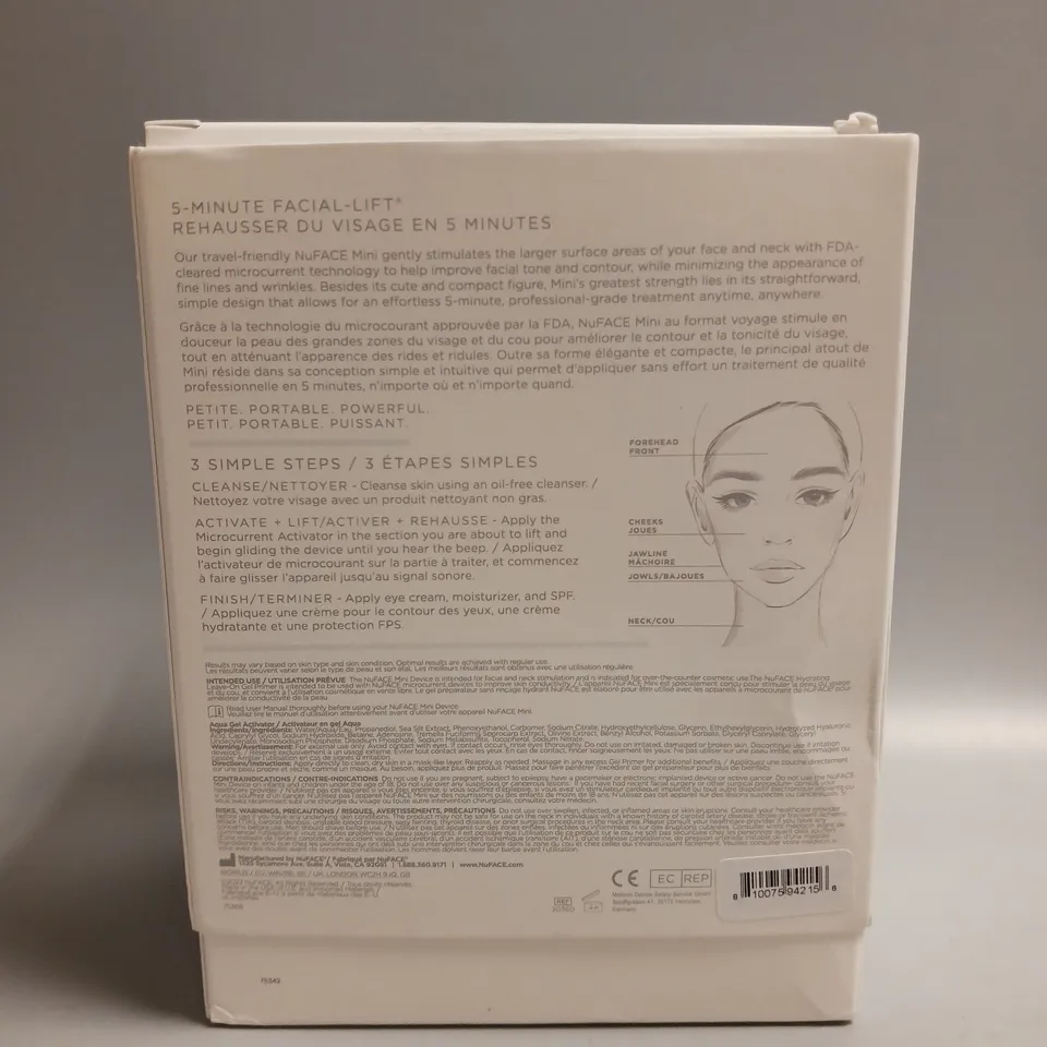 BOXED NUFACE MINI PETITE FACIAL TONING DEVICE WHITE AND GREY INCLUDES HYDRATING AQUA GEL, CHARGING CABLE AND 2 PLUG ADAPTORS