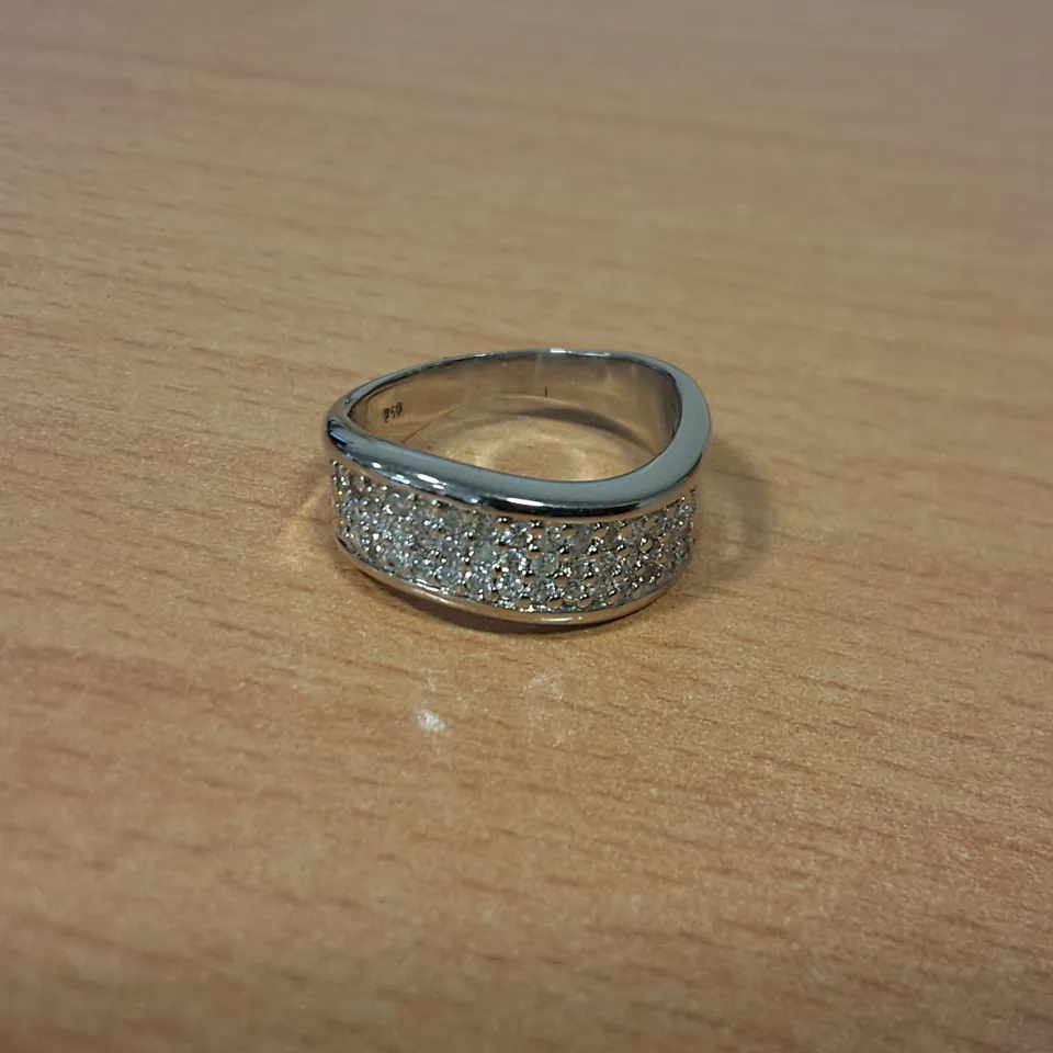 18CT WHITE GOLD WAVE RING SET WITH NATURAL DIAMONDS