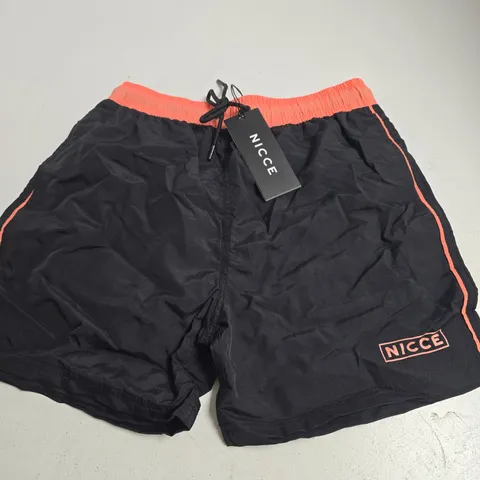 NICCE LANDA SWIMMING SHORTS IN BLACK/PEACH - SMALL