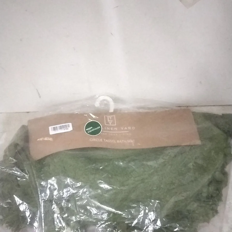 PACKAGED THE LINEN YARD CIRCLE TASSEL BATH MAT - GREEN 