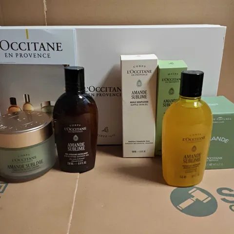 BOXED L'OCCITANE 6-PIECE COSMETICS SET TO INCLUDE SCENTED CANDLE, SMOOTHING MILK CONCENTRATE AND SUPPLE SKN OIL