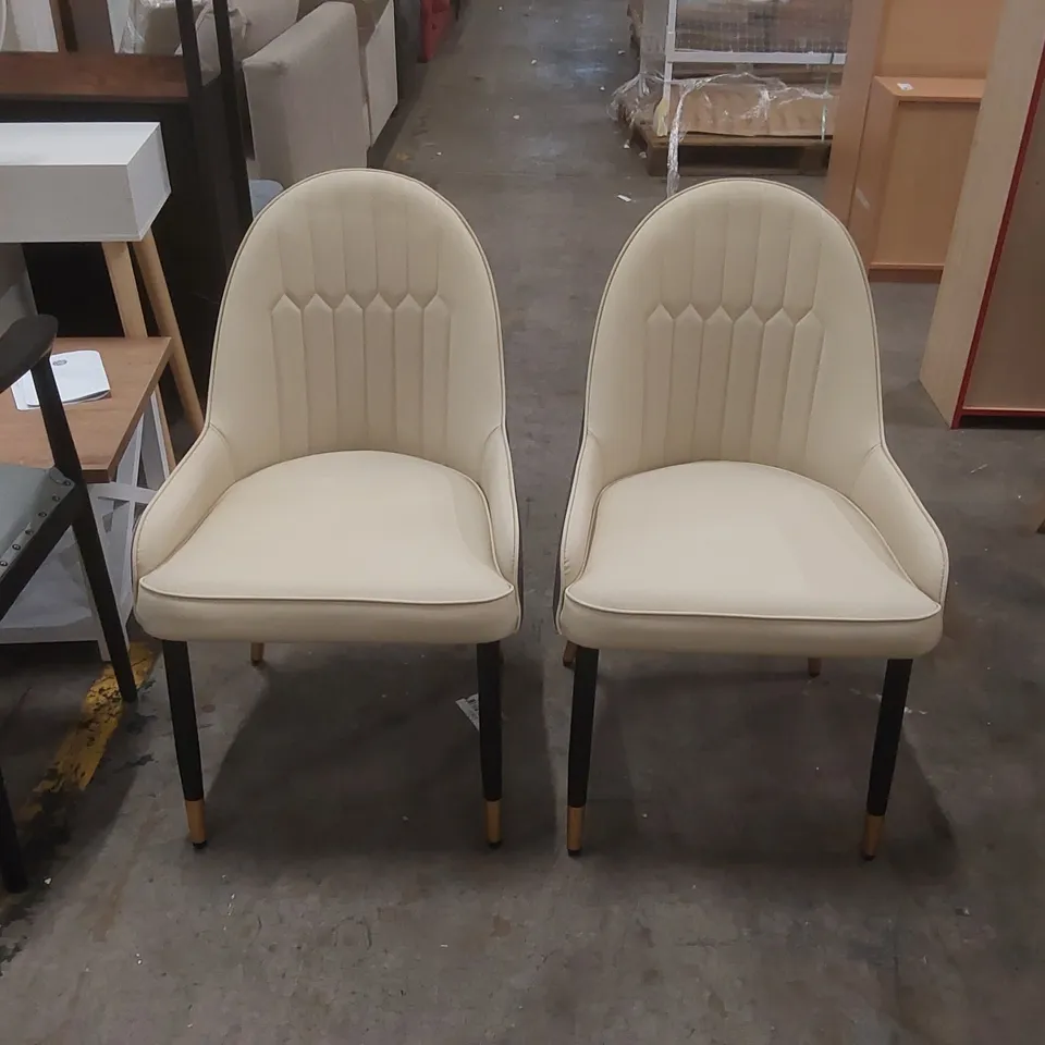 PAIR OF DESIGNER LEATHER DINING CHAIRS