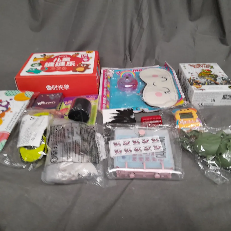 APPROXIMATELY 10 ASSORTED TOYS AND GAMES TO INCLUDE CARD GAMES, MODEL CARS AND SLEEP MASK
