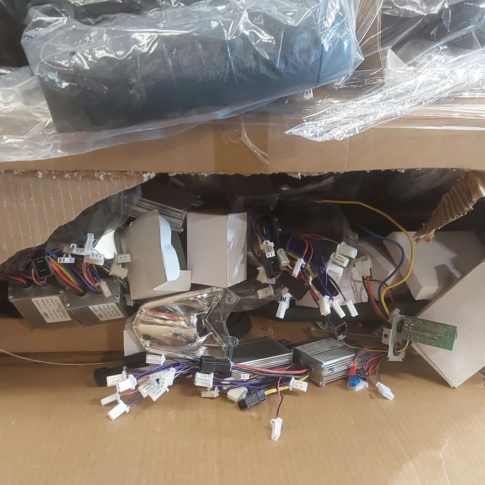 PALLET CONTAINING A VERY LARGE QUANTITY OF ASSORTED ITEMS INCLUDING: DC MOTORS, ENGINE PARTS, TOY CAR SEAT, TOY CAR FAIRINGS ECT