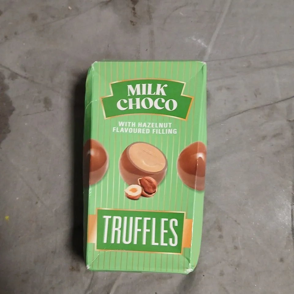 APPROXIMATELY 12 ASSORTED FOOD ITEMS INCLUDING LINDT CHOCOLATES , HAZELNUT TRUFFLES AND RAVE COFFEE