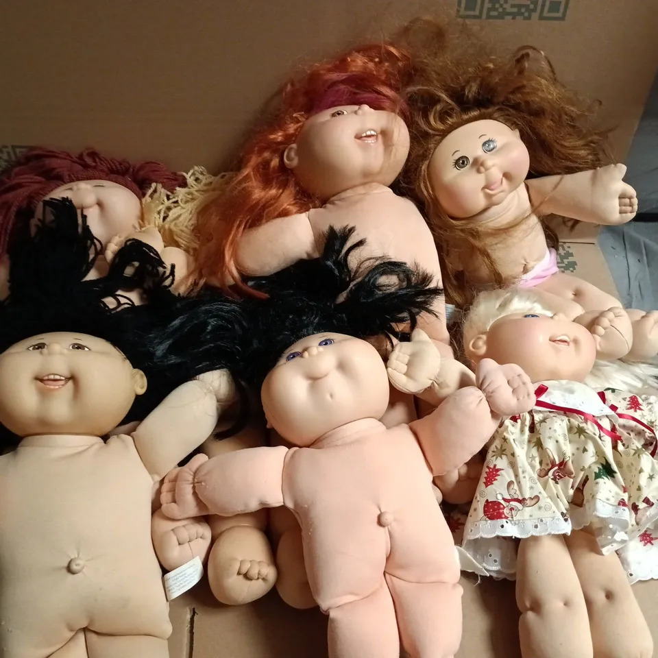 LOT OF 7 ASSORTED FABRIC KIDS DOLLS WITH VINYL HEADS