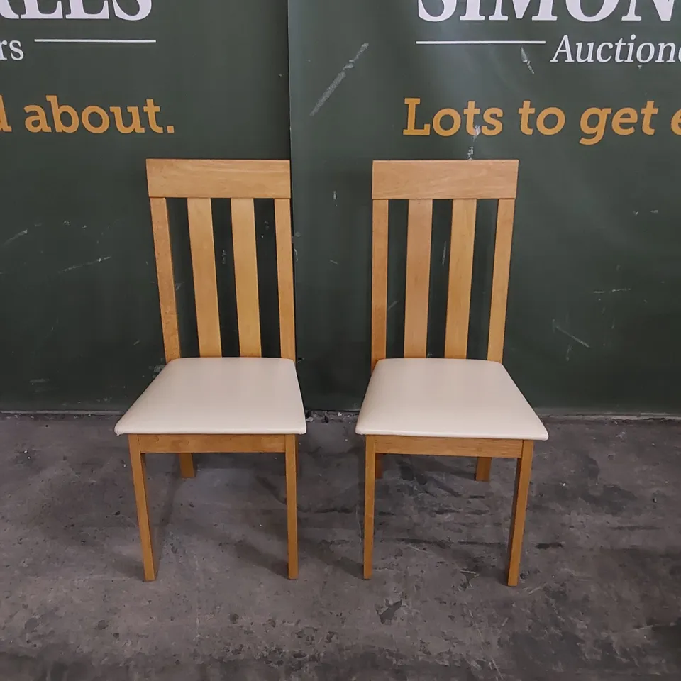SET OF 2 CHESTER OAK DINING CHAIRS WITH IVORY LEATHER SEAT PADS 
