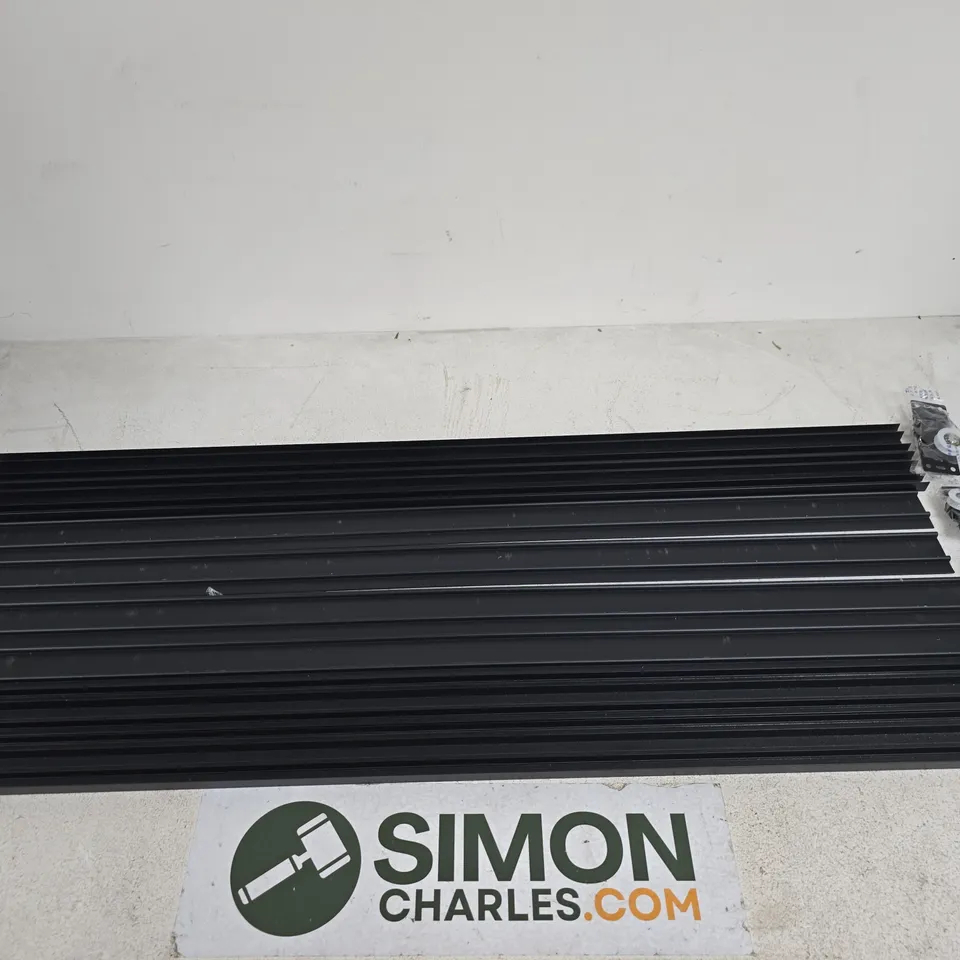 Black finned panels with mounting hardware