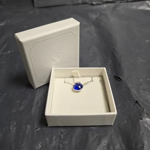 SWAROVSKI PENDANT NECKLACE WITH BLUE GEMSTONE IN PRESENTATION BOX
