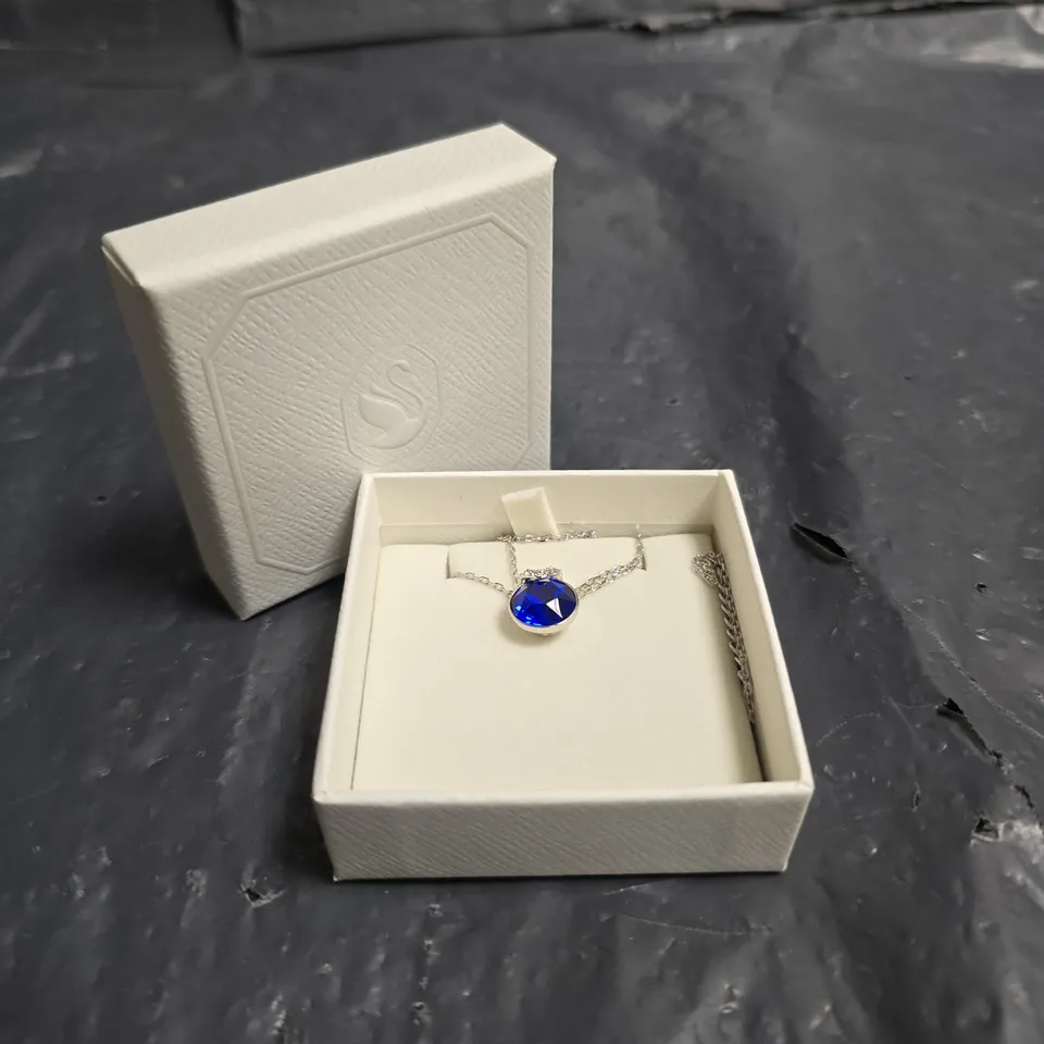 SWAROVSKI PENDANT NECKLACE WITH BLUE GEMSTONE IN PRESENTATION BOX