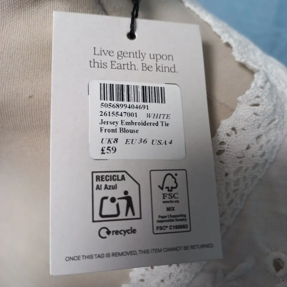 NOBODYS CHILD JERSEY EMBROIDERED TIE FRONT BLOUSE IN WHITE - UK 8