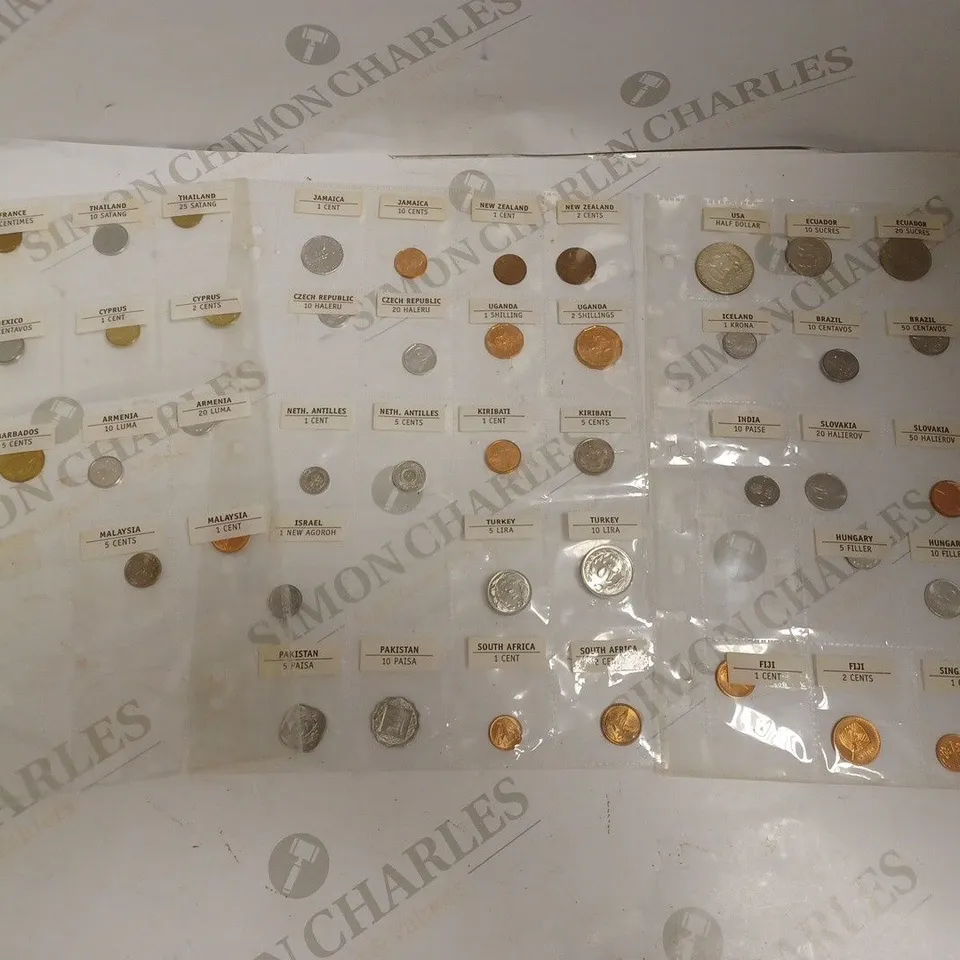 COLLECTION OF ASSORTED COINS IN VARIOUS CURRENCIES FROM AROUND THE WORLD