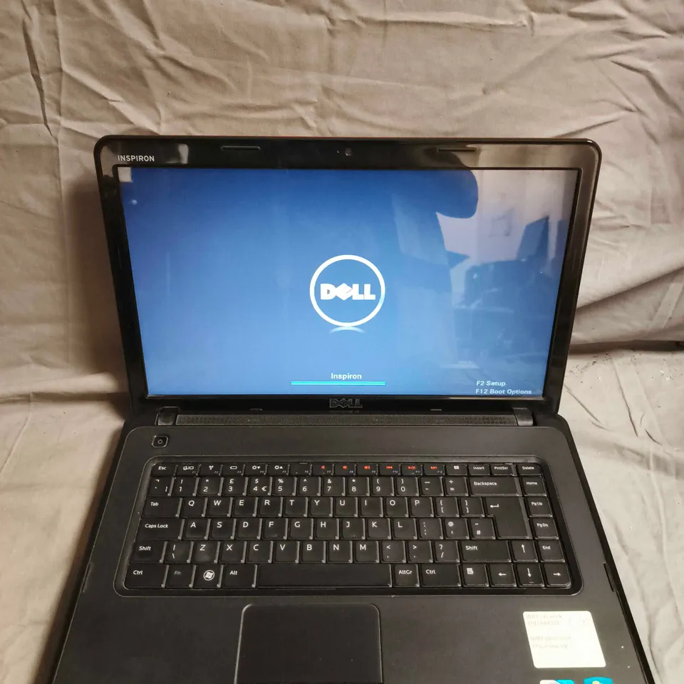 DELL INSPIRON LAPTOP – BLACK CHASSIS (LID MAY APPEAR RED IN LIGHTING)