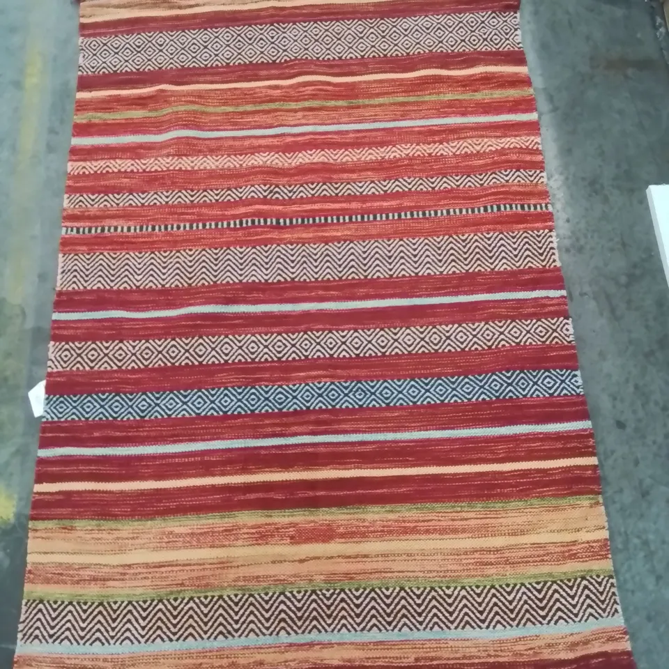 CHIODO STRIPED HAND WOVEN AREA RUG