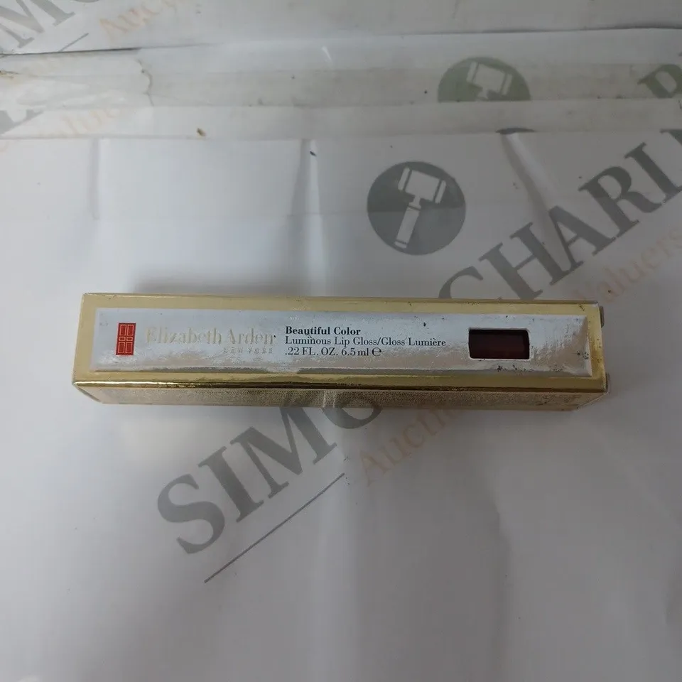 BOX OF APPROX 10 ELIZABETH ARDEN BEAUTIFUL COLOUR LUMINOUS LIP GLOSS. 