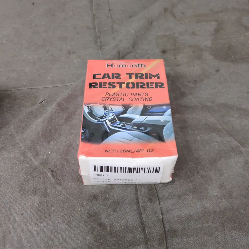 BOX OF APPROXIMATELY 20 ASSORTED AUTO ITEMS INCLUDING CAR TRIM RESTORER , RATCHET STRAP AND STEALTHPLATE 