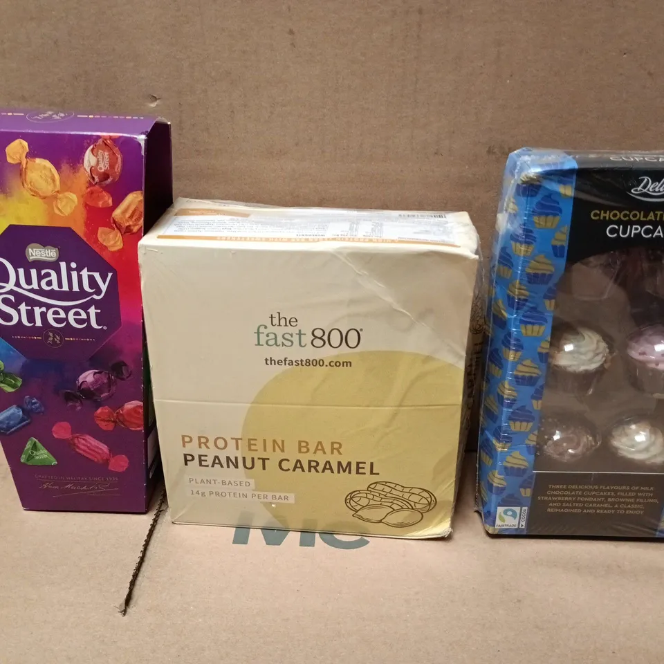 APPROXIMATELY 12 ASSORTED FOOD AND DRINKS ITEMS TO INCLUDE - QUALITY STREET, HOTEL CHOCOLAT AND PROTEIN BARS
