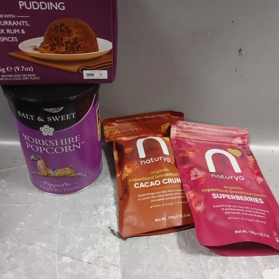 box of assorted food items to include coles pudding - naturya - Yorkshire popcorn 